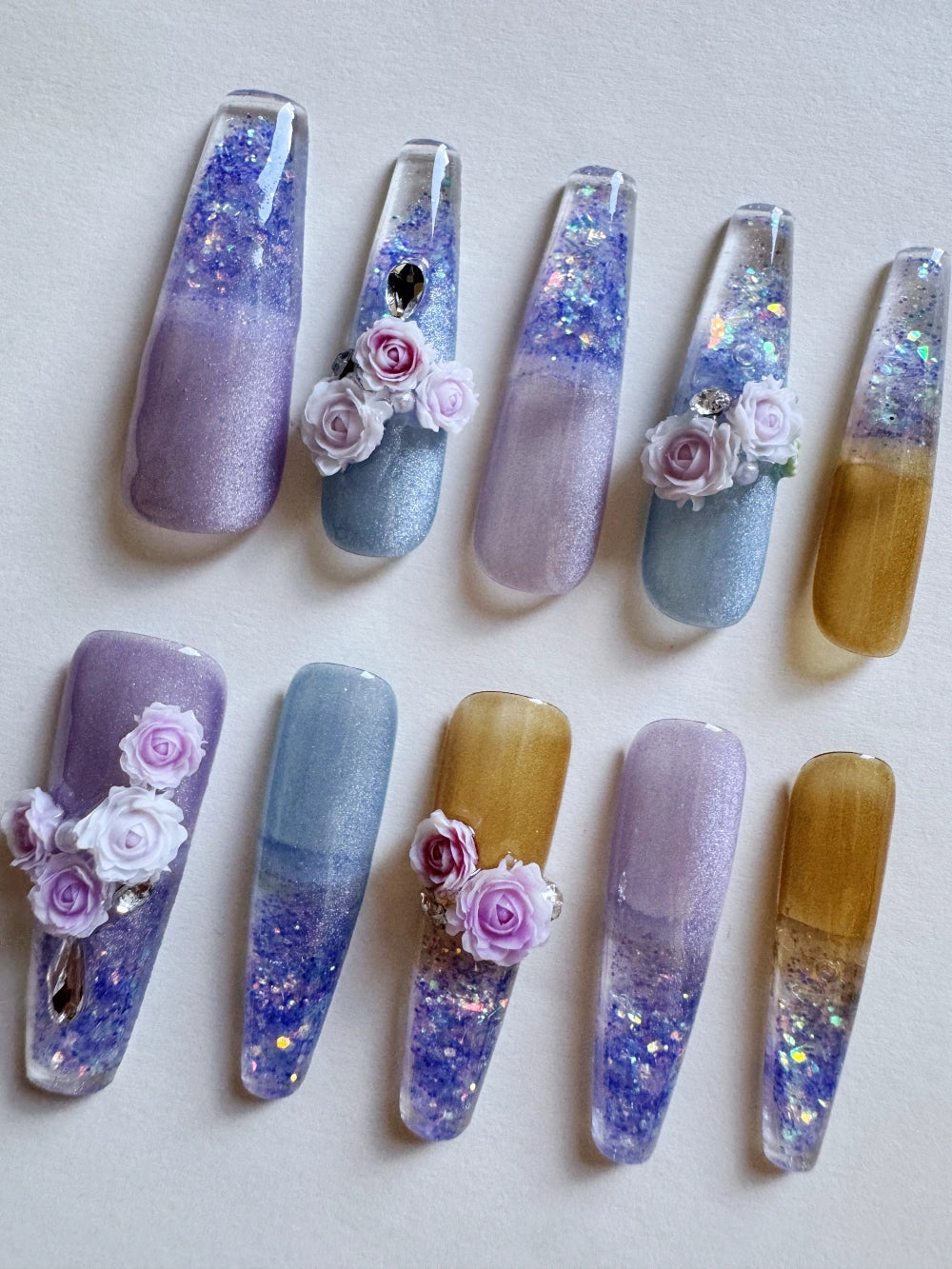 Hand Drawn Elaborate Cool Purple Glittering Cat Eye Flowing Sand Nail Art